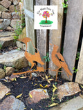 Pair of rusty metal magpie ground stakes image 0