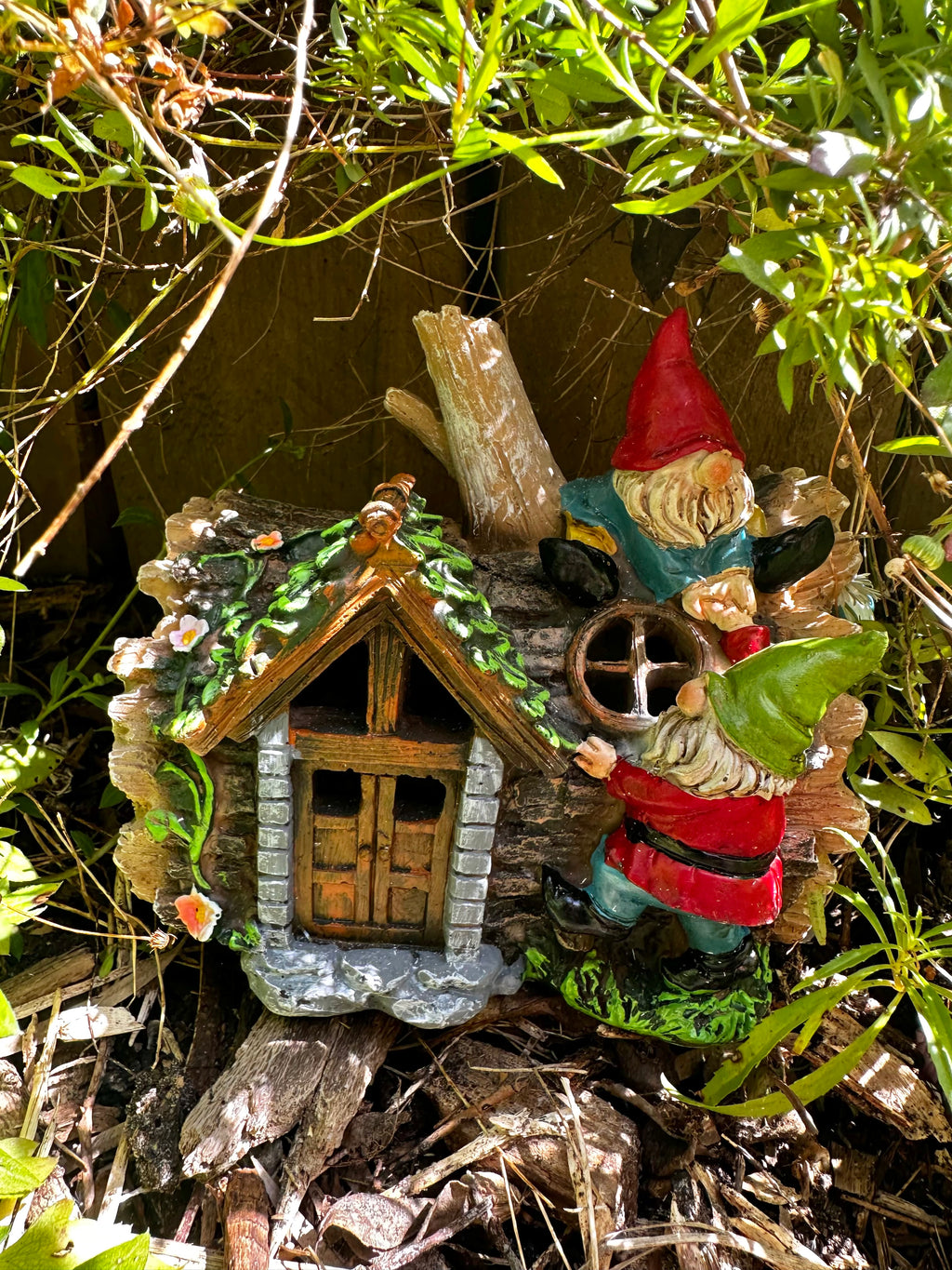 Solar gnome log cabin house