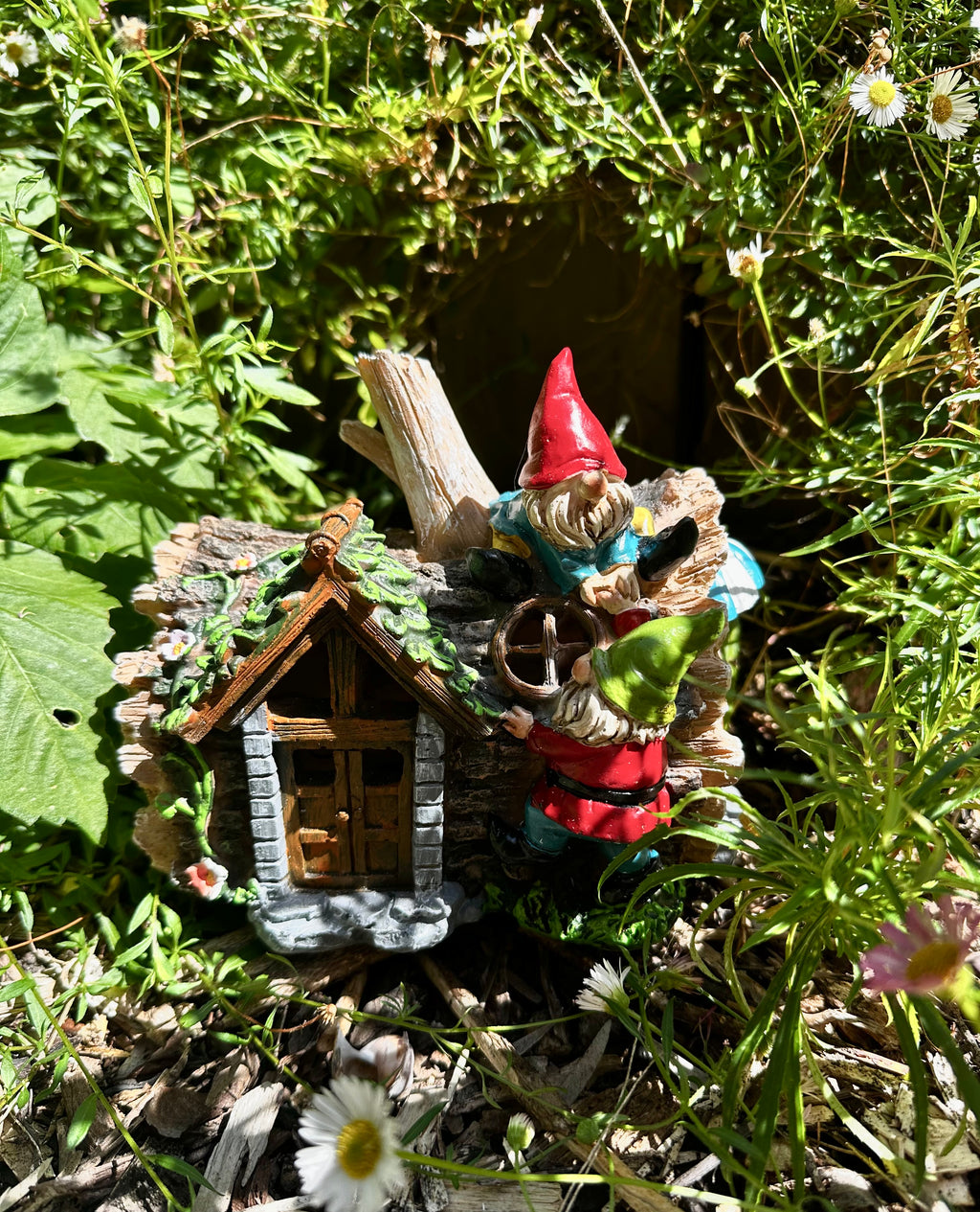 Solar gnome log cabin house