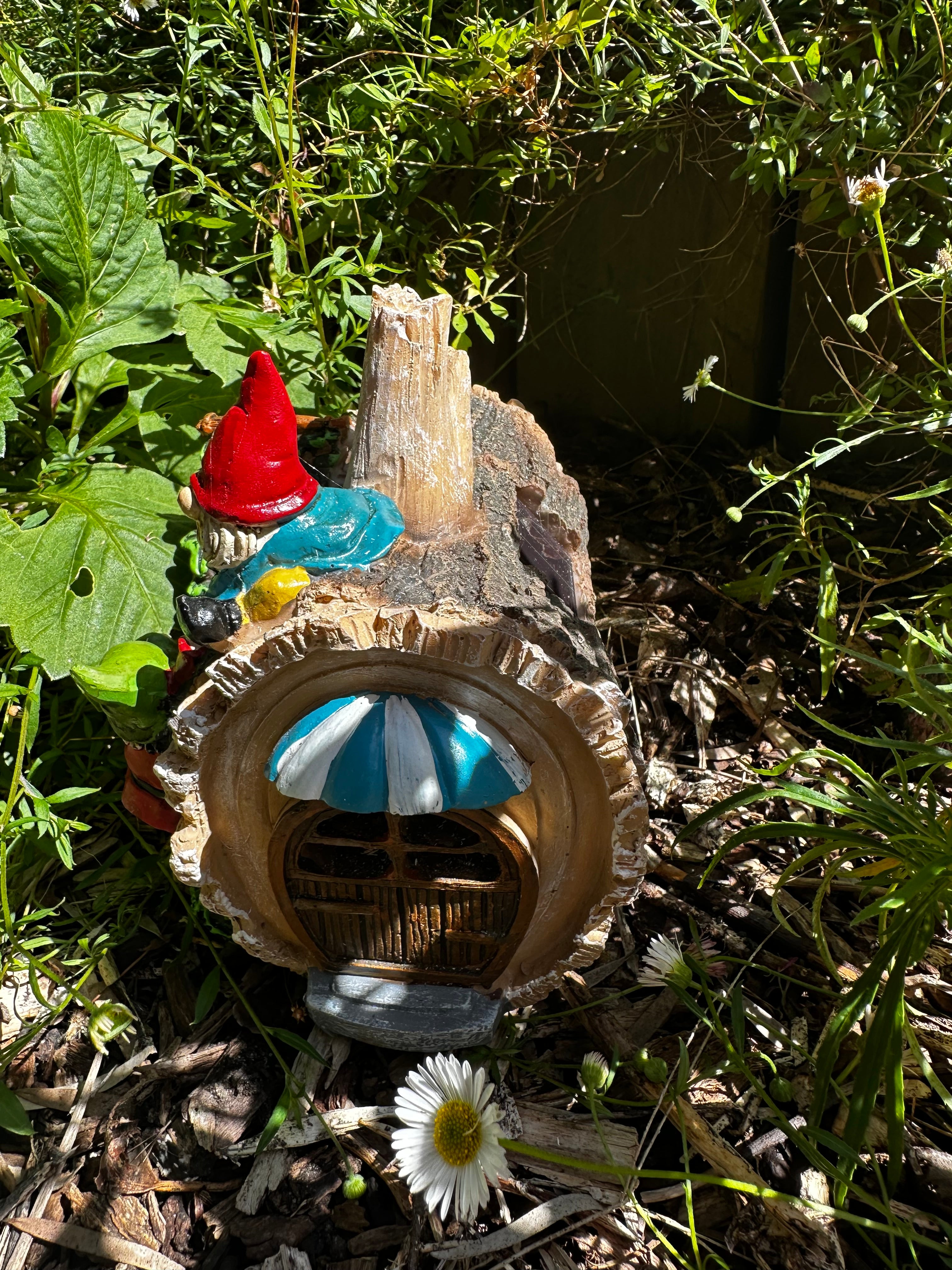 Solar gnome log cabin house